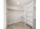 Walk-in closet with plenty of shelving for storage and a clothing rack at 13601 N 50Th Pl, Scottsdale, AZ 85254