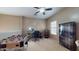 This versatile bedroom space features a desk area and foosball table for entertainment at 16807 W Carmen Dr, Surprise, AZ 85388