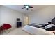 This bedroom features a modern design with a contrasting black and white color scheme at 16807 W Carmen Dr, Surprise, AZ 85388