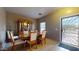 Formal dining room with decorative hutch and matching table, perfect for hosting dinner parties at 16807 W Carmen Dr, Surprise, AZ 85388