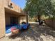 A relaxing backyard featuring a covered patio and lots of room for seating at 2014 N 93Rd Dr, Phoenix, AZ 85037