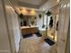Spacious bathroom featuring a double vanity, soaking tub, and separate glass shower at 2014 N 93Rd Dr, Phoenix, AZ 85037