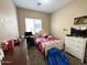 Bedroom with neutral paint and carpet at 2014 N 93Rd Dr, Phoenix, AZ 85037