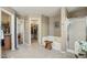 Bathroom with soaking tub, walk-in shower, and walk-in closet at 2061 E Flintlock Way, Chandler, AZ 85286