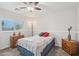 Bedroom with cool tones, natural light, and neutral walls at 2061 E Flintlock Way, Chandler, AZ 85286