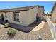 Well-maintained backyard with pathway, rock landscaping, and charming exterior details at 2101 S Meridian Rd # 199, Apache Junction, AZ 85120