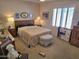 Inviting bedroom with shuttered window, neutral color scheme, and a cozy, welcoming atmosphere at 2101 S Meridian Rd # 199, Apache Junction, AZ 85120