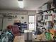 Organized garage with workbench, tools, and ample storage space, perfect for DIY projects at 2101 S Meridian Rd # 199, Apache Junction, AZ 85120