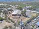 Scenic aerial view of home with tile roof and a large, fenced lot at 2627 W Buckskin Trl, New River, AZ 85087