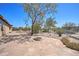 Flagstone patio and fire pit perfect for entertaining at 2627 W Buckskin Trl, New River, AZ 85087