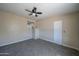 Neutral bedroom with a view and carpet flooring at 2627 W Buckskin Trl, New River, AZ 85087