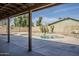 Backyard view featuring a refreshing in-ground pool and a covered patio at 2728 W Redfield Rd, Phoenix, AZ 85053