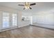 Open-concept living space featuring a modern kitchen and access to the outdoor patio at 2728 W Redfield Rd, Phoenix, AZ 85053