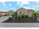 Attractive home featuring well-manicured desert landscaping and a cozy design at 27308 N 56Th Dr, Phoenix, AZ 85083