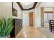 Elegant foyer with tile flooring, neutral walls, and tasteful decor at 27308 N 56Th Dr, Phoenix, AZ 85083