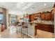 Lovely kitchen with stainless appliances, granite counters, and seating at 27308 N 56Th Dr, Phoenix, AZ 85083