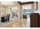 Open-concept with dining, living, and fireplace, perfect for entertaining at 27308 N 56Th Dr, Phoenix, AZ 85083