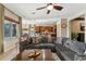 Cozy living room with a large sectional sofa and an open-concept design at 27308 N 56Th Dr, Phoenix, AZ 85083