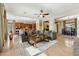 Open concept layout with living room, kitchen and dining area at 27308 N 56Th Dr, Phoenix, AZ 85083