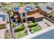 Two-story home boasts desert landscaping, solar panels, covered patio, and attached garage at 27809 N Silverado Ranch Rd, Peoria, AZ 85383
