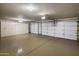 Spacious, three-car garage features a finished floor and plenty of built-in storage space at 28897 N 94Th Pl, Scottsdale, AZ 85262