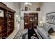 Open-concept living area with tiled floors, and built-in shelving at 28897 N 94Th Pl, Scottsdale, AZ 85262