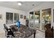 Bright office space with backyard pool view through sliding glass door at 28897 N 94Th Pl, Scottsdale, AZ 85262