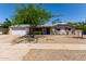 Charming single story home with desert landscaping and shade tree at 3030 E Shangri La Rd, Phoenix, AZ 85028