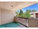 Cozy balcony offering views of lush trees and blue skies at 3031 N Civic Center Plz # 317, Scottsdale, AZ 85251