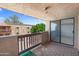 Comfortable balcony with outdoor views, featuring tile and carpeted flooring at 3031 N Civic Center Plz # 317, Scottsdale, AZ 85251