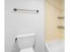 Bathroom showcasing a toilet, towel rack and combined tub/shower at 3031 N Civic Center Plz # 317, Scottsdale, AZ 85251