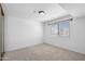 Spacious bedroom with plush carpet, ample natural light, and neutral walls at 3031 N Civic Center Plz # 317, Scottsdale, AZ 85251