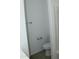 Bathroom featuring toilet and towel racks at 30918 W Mulberry W Dr, Buckeye, AZ 85396