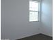 Carpeted bedroom with a window at 30918 W Mulberry W Dr, Buckeye, AZ 85396