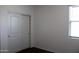 Bedroom featuring carpet, closet, and window at 30918 W Mulberry W Dr, Buckeye, AZ 85396