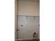 Laundry room showing hookups and shelving at 30918 W Mulberry W Dr, Buckeye, AZ 85396