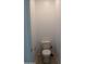 A clean half bath with toilet in neutral decor at 30918 W Mulberry W Dr, Buckeye, AZ 85396