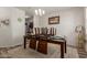 This dining area features a chandelier and neutral wall color at 3113 N 303Rd Dr, Buckeye, AZ 85396