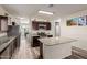 Modern kitchen featuring granite countertops, stainless steel appliances, and an island at 3113 N 303Rd Dr, Buckeye, AZ 85396