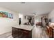 Spacious open-concept living area combining the kitchen, dining, and living room, great for entertaining at 3113 N 303Rd Dr, Buckeye, AZ 85396