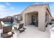 Inviting backyard featuring a narrow pool, lounge area, and covered patio with outdoor seating at 32567 N 133Rd Ave, Peoria, AZ 85383