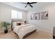 Inviting bedroom features a plush bed, modern decor, and a calming ambiance for restful nights at 32567 N 133Rd Ave, Peoria, AZ 85383