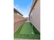 Backyard putting green with artificial turf and flags for practice at 32567 N 133Rd Ave, Peoria, AZ 85383