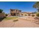 Expansive backyard featuring a refreshing pool and well-maintained landscaping, perfect for outdoor entertaining at 3381 E Canary Way, Chandler, AZ 85286