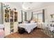Cozy bedroom with a large window and shelves at 3381 E Canary Way, Chandler, AZ 85286