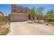 Charming two-story home with a well-manicured front yard and an attached two-car garage at 3381 E Canary Way, Chandler, AZ 85286