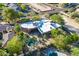 Stunning aerial view showcases the luxurious backyard oasis with a private pool and lush landscaping at 3405 E Knox Rd, Phoenix, AZ 85044