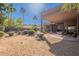 Expansive backyard featuring a covered patio and lush landscaping, perfect for outdoor living at 3405 E Knox Rd, Phoenix, AZ 85044