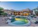 Stunning backyard oasis featuring a sparkling pool and ample space for entertaining at 3405 E Knox Rd, Phoenix, AZ 85044