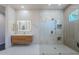 Modern bathroom with a glass-enclosed shower, sleek vanity, and recessed lighting at 3405 E Knox Rd, Phoenix, AZ 85044